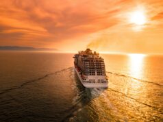 Check out the World’s Most Unusual Cruise Destinations a boat set off into the sunset