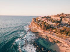 The Bondi to Coogee Coastal Trail: Sydney’s Most Scenic Adventure red cliffs dropping into clear water