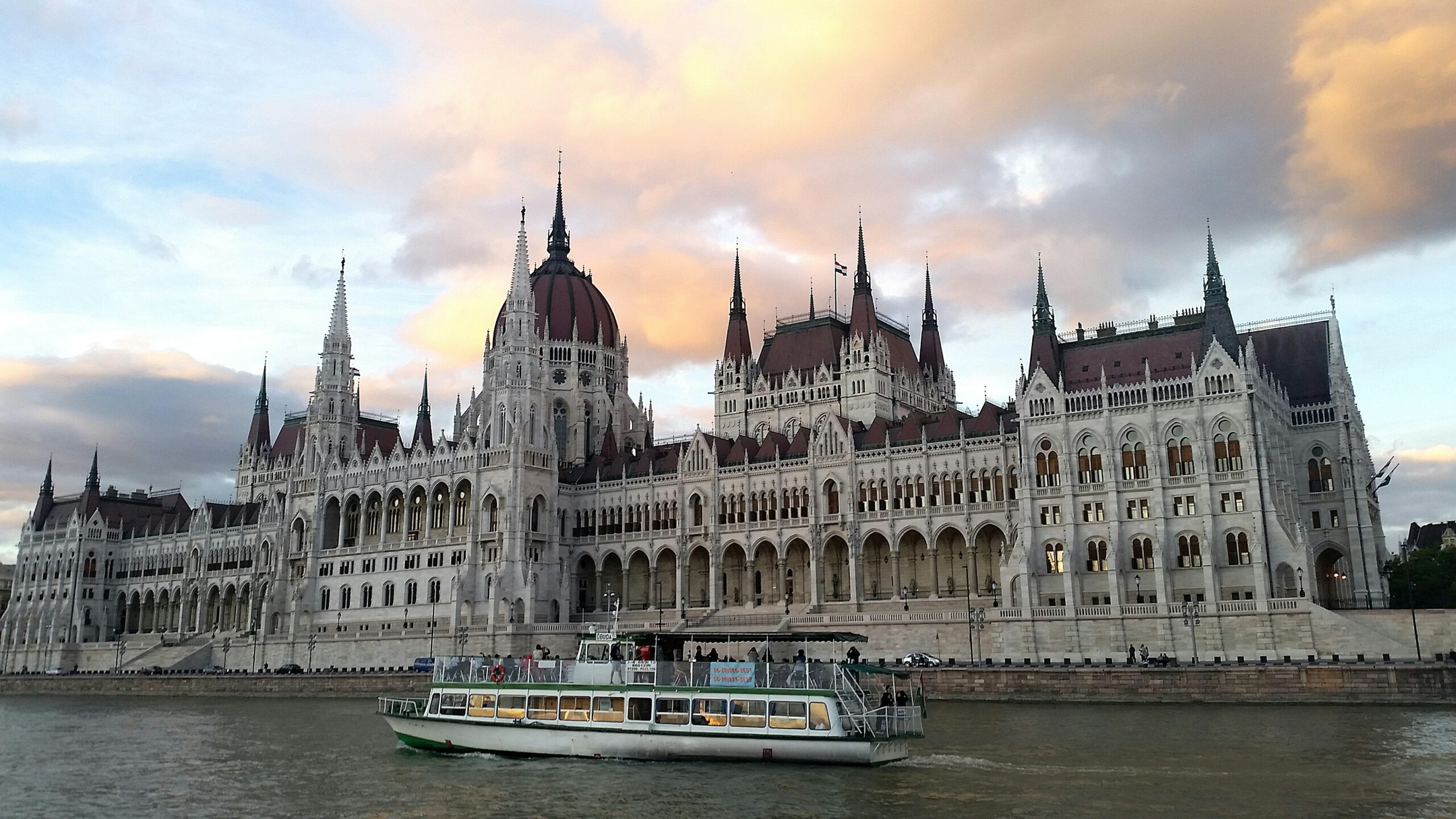 a boat in front of an old building