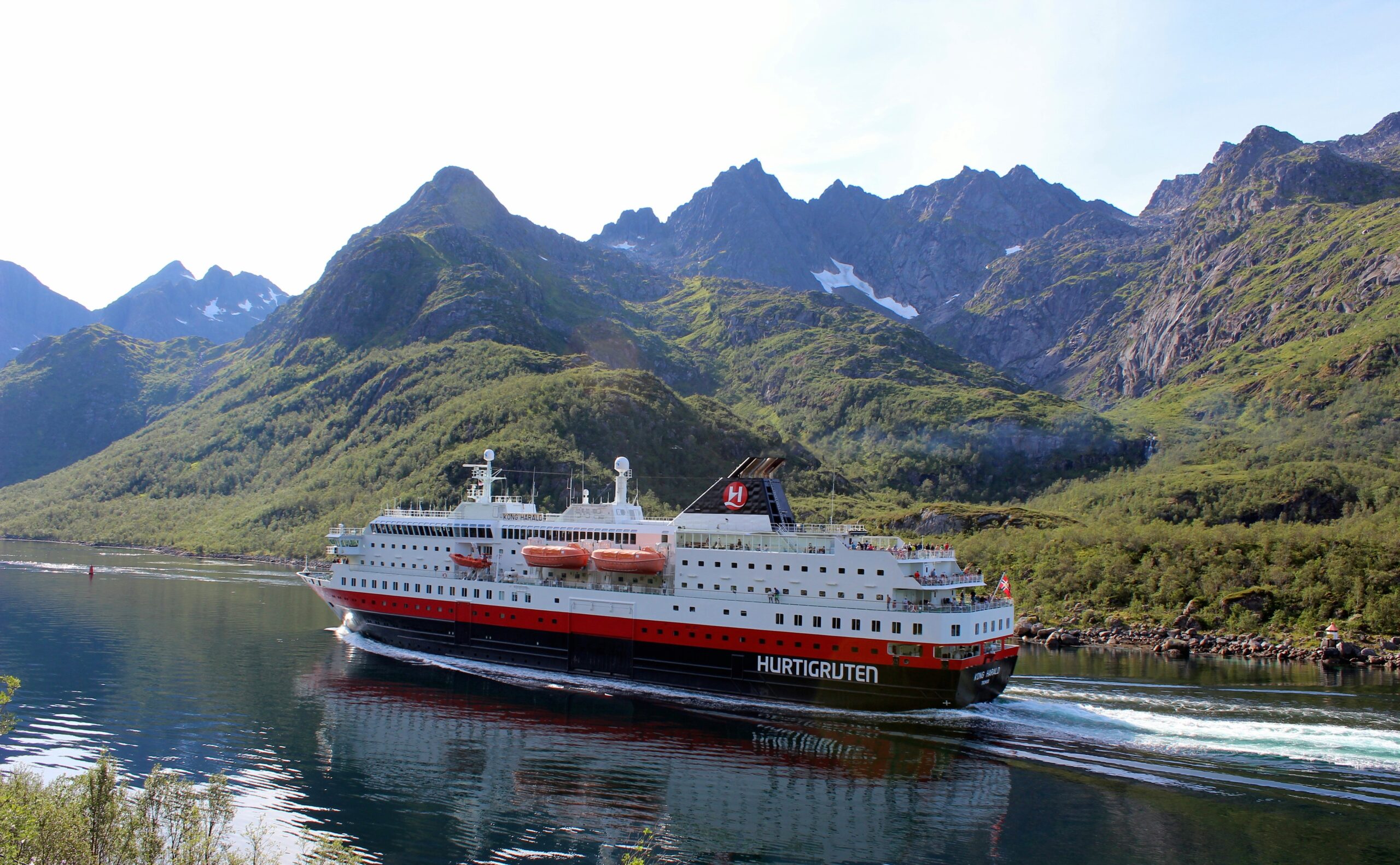 a ferry cruising the fjord
