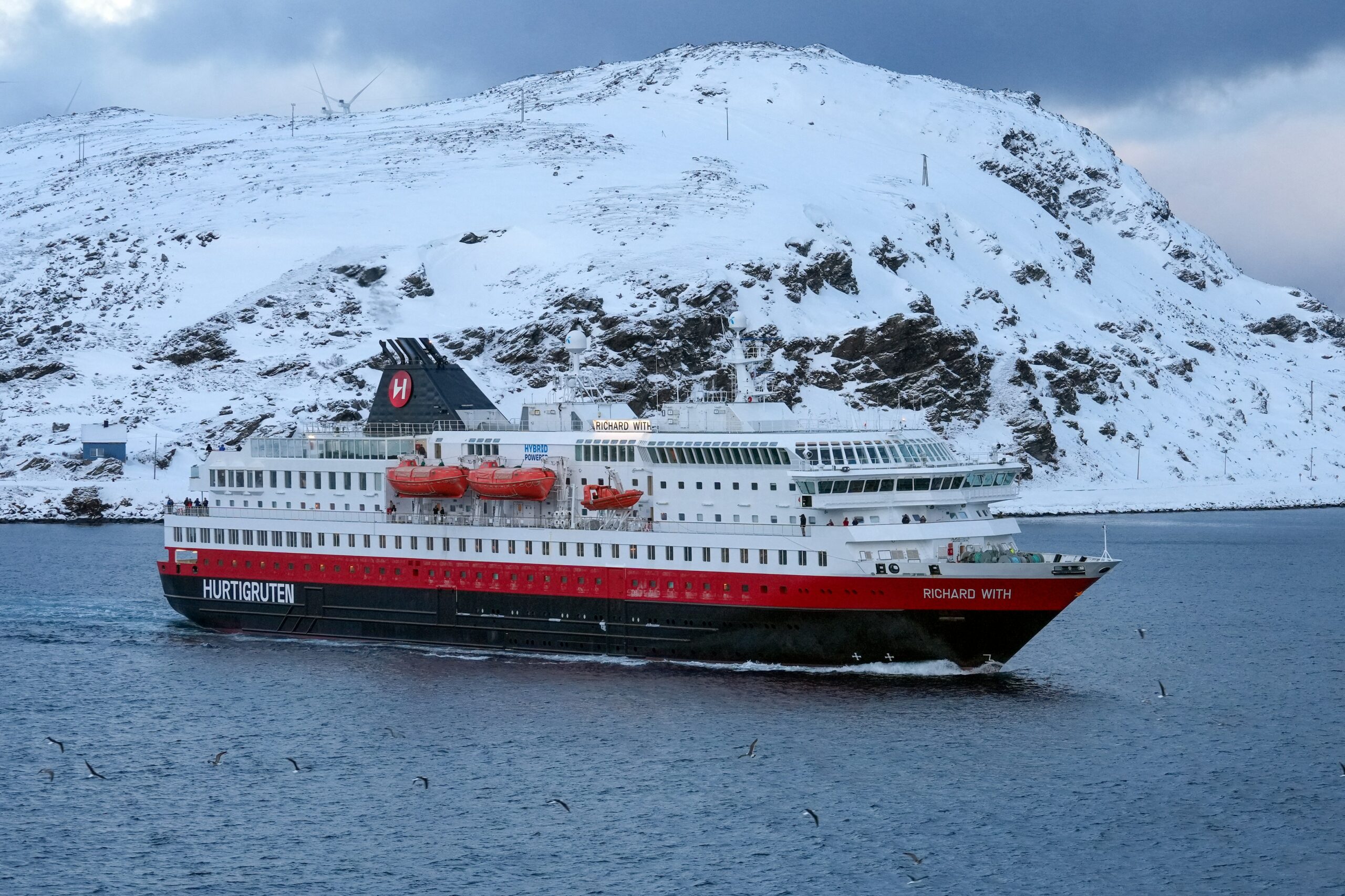 a ferry in the winter fjord