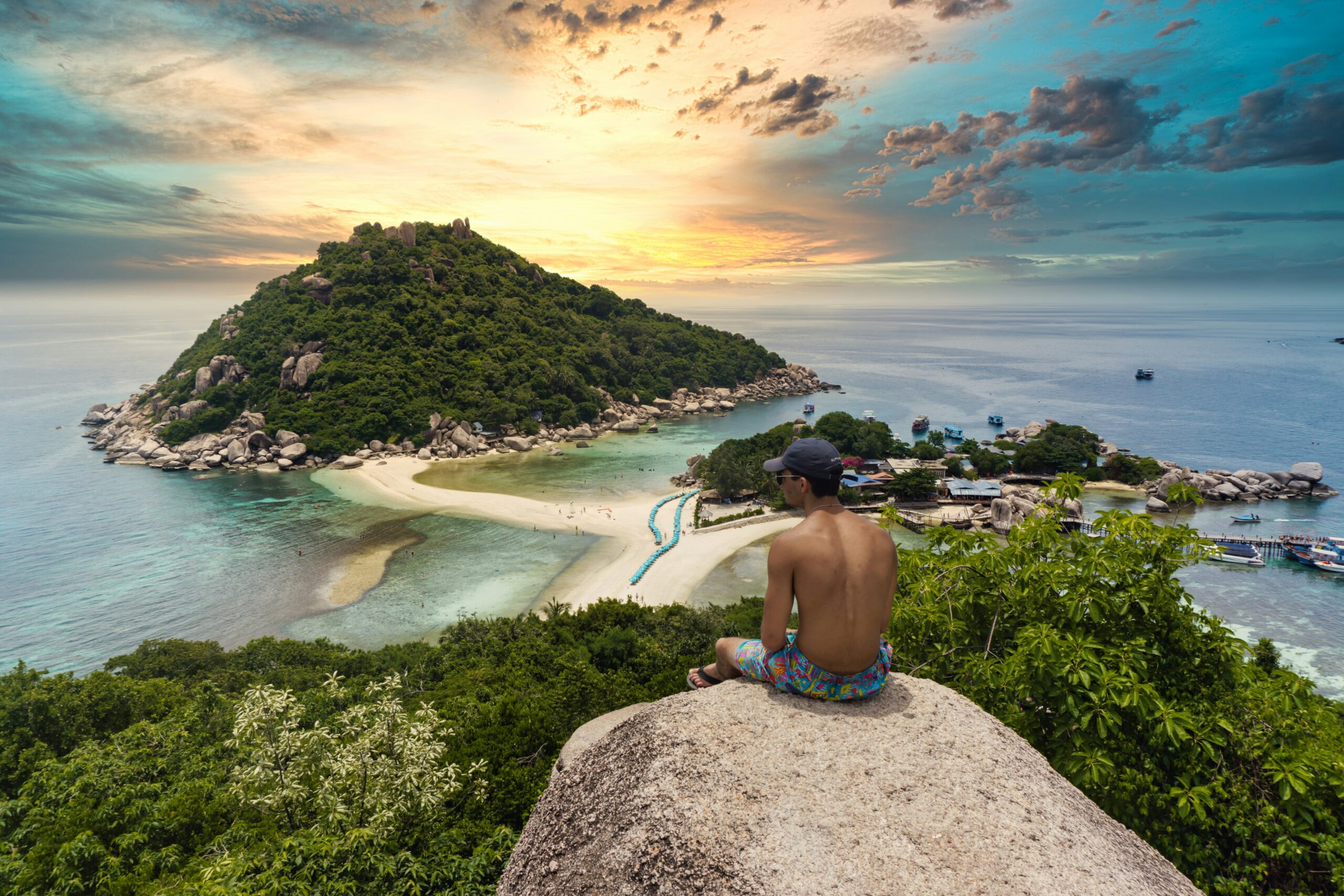 a guy watching an island