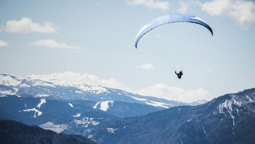 paragliding high in the sky
