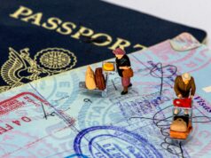 The End of an Era: Why Your Passport Is Losing Its Stamps small guys walking on a passport