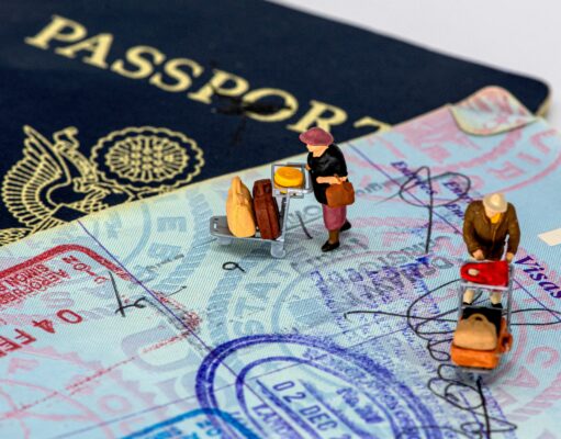 The End of an Era: Why Your Passport Is Losing Its Stamps small guys walking on a passport