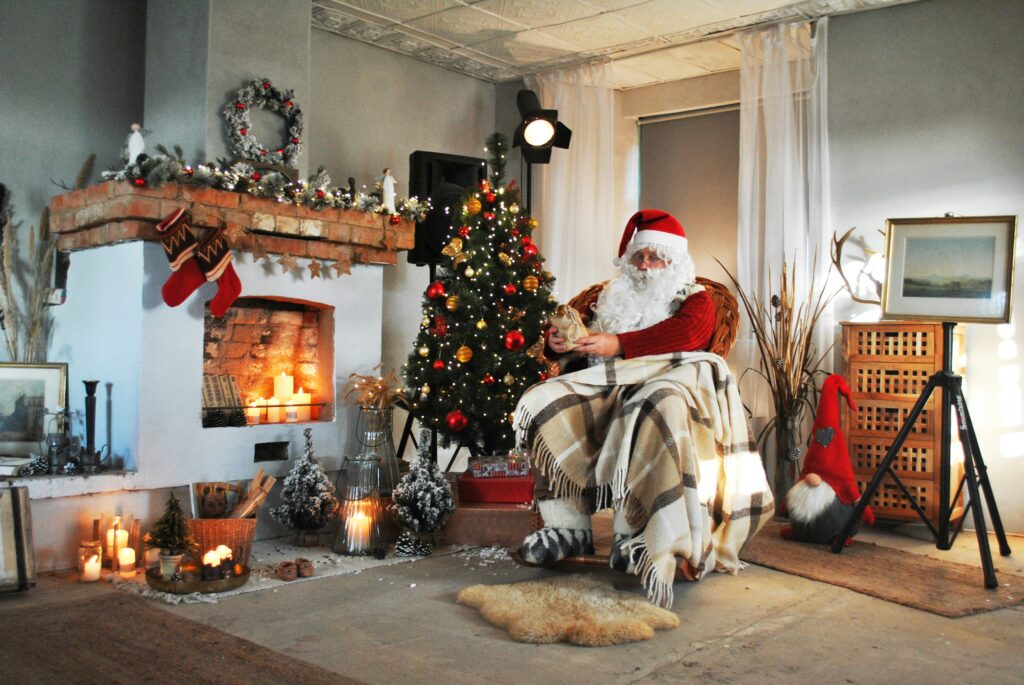 Santa claus in front of an open fire