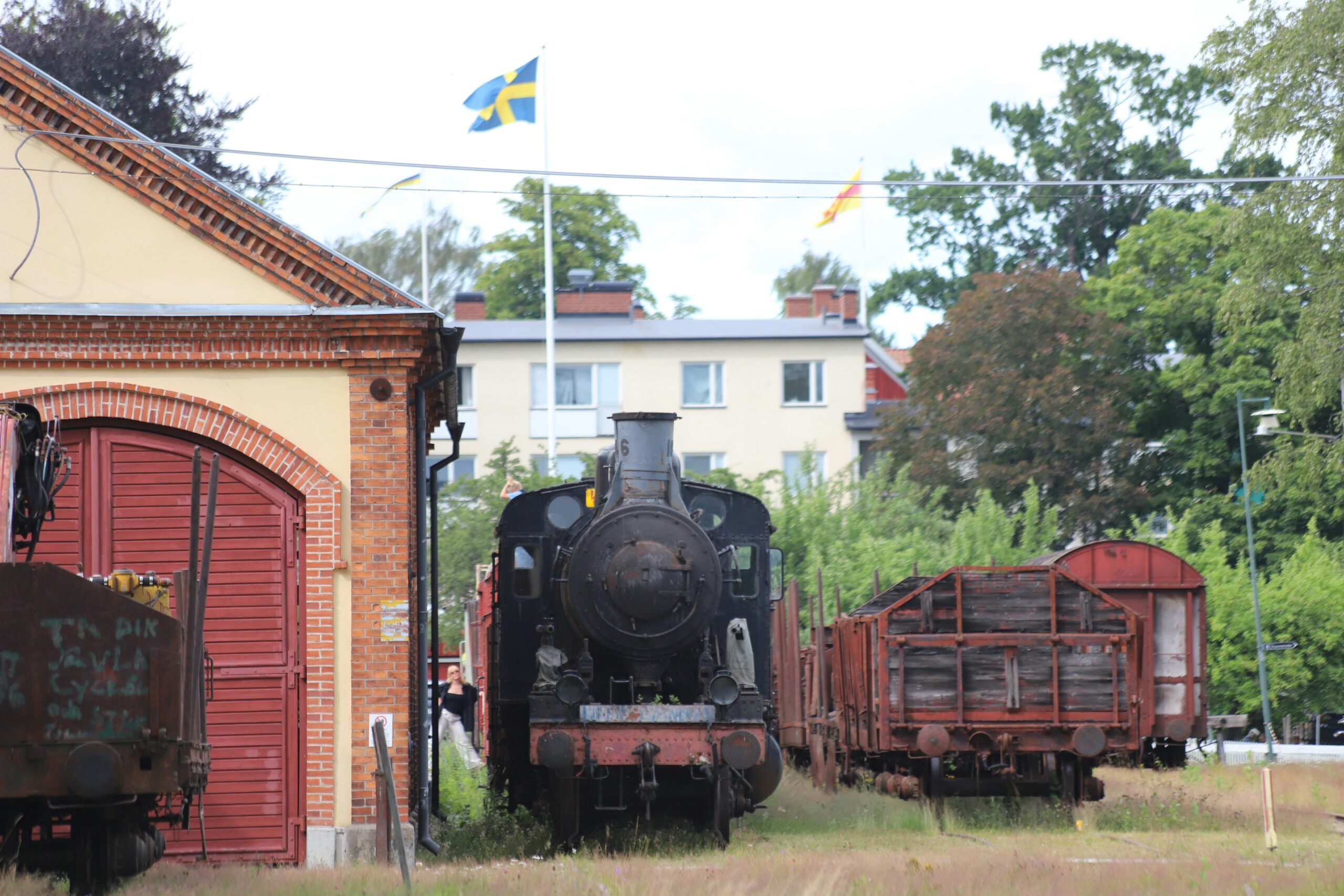 steam train and a swedish flag