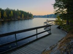 Bergslagsleden Trail Guide – 280 km of Hiking in the Heart of Sweden walking on a lake