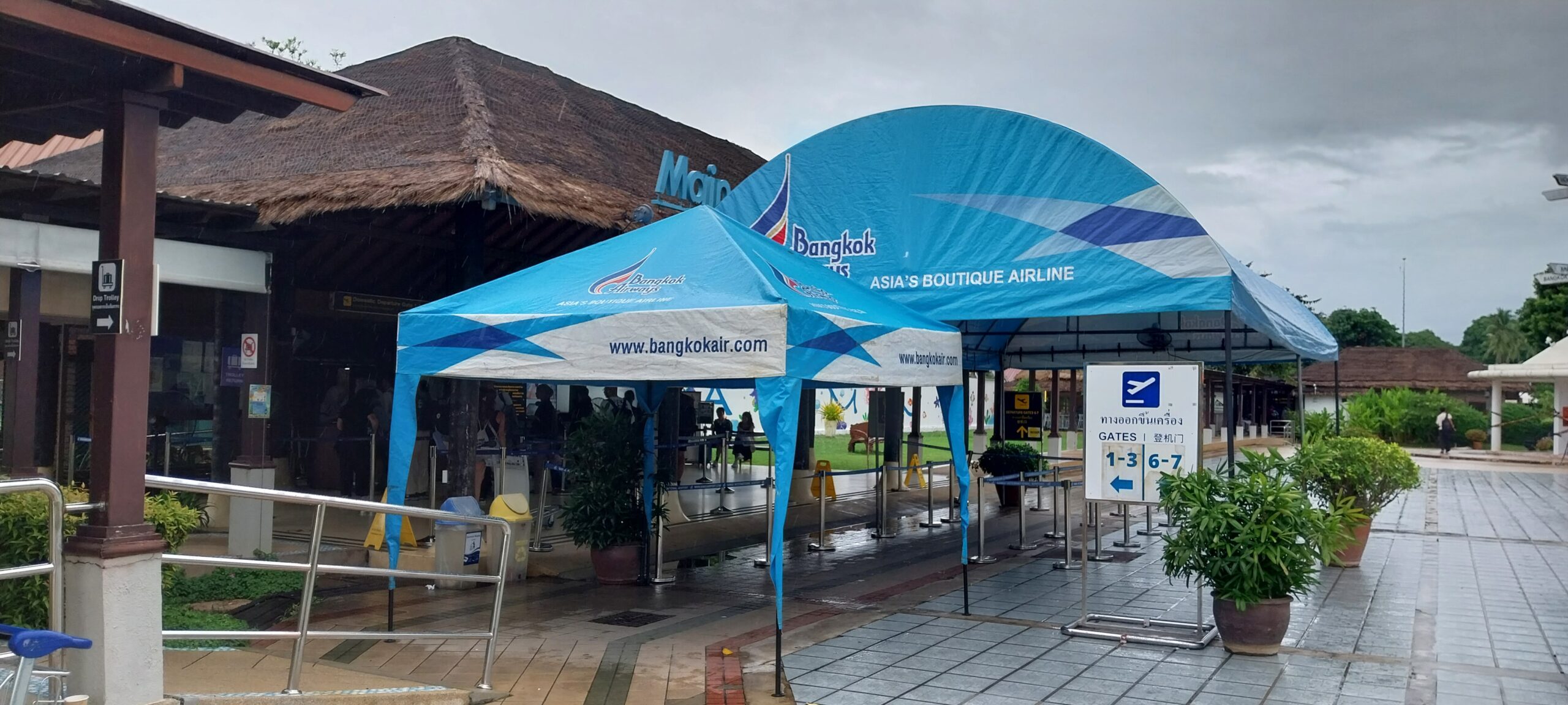 a blue tent in the rain