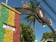A Visit to the Bob Marley Museum: Walking in the Footsteps of a Legend a red green and yellow wall