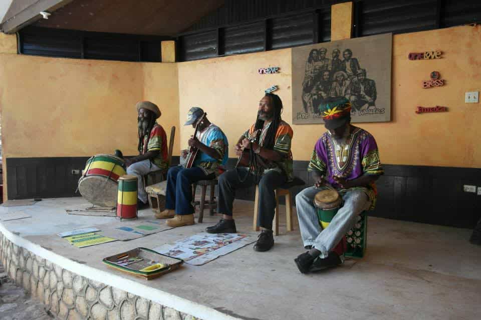 four guys playing instruments