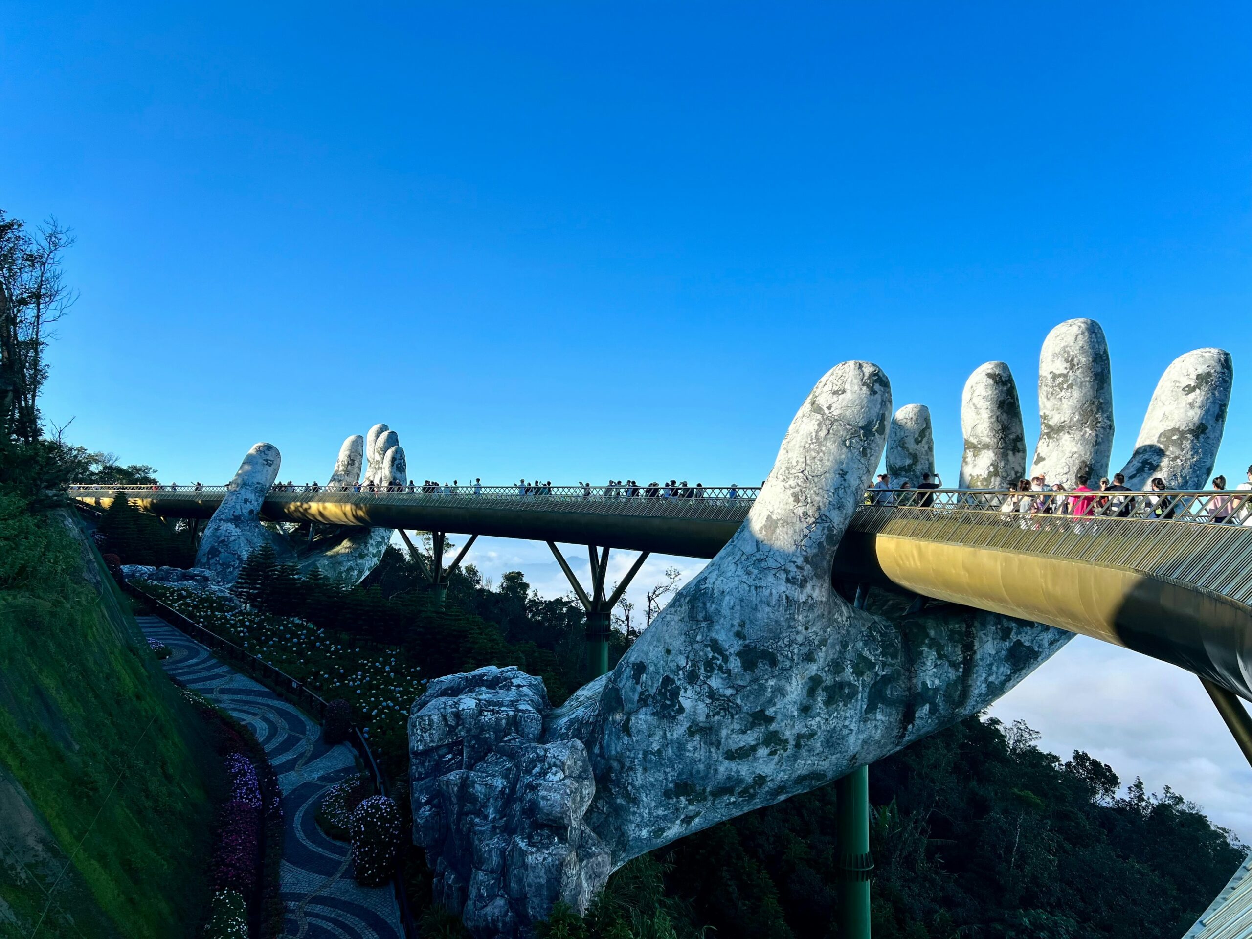 hands holding a walking bridge