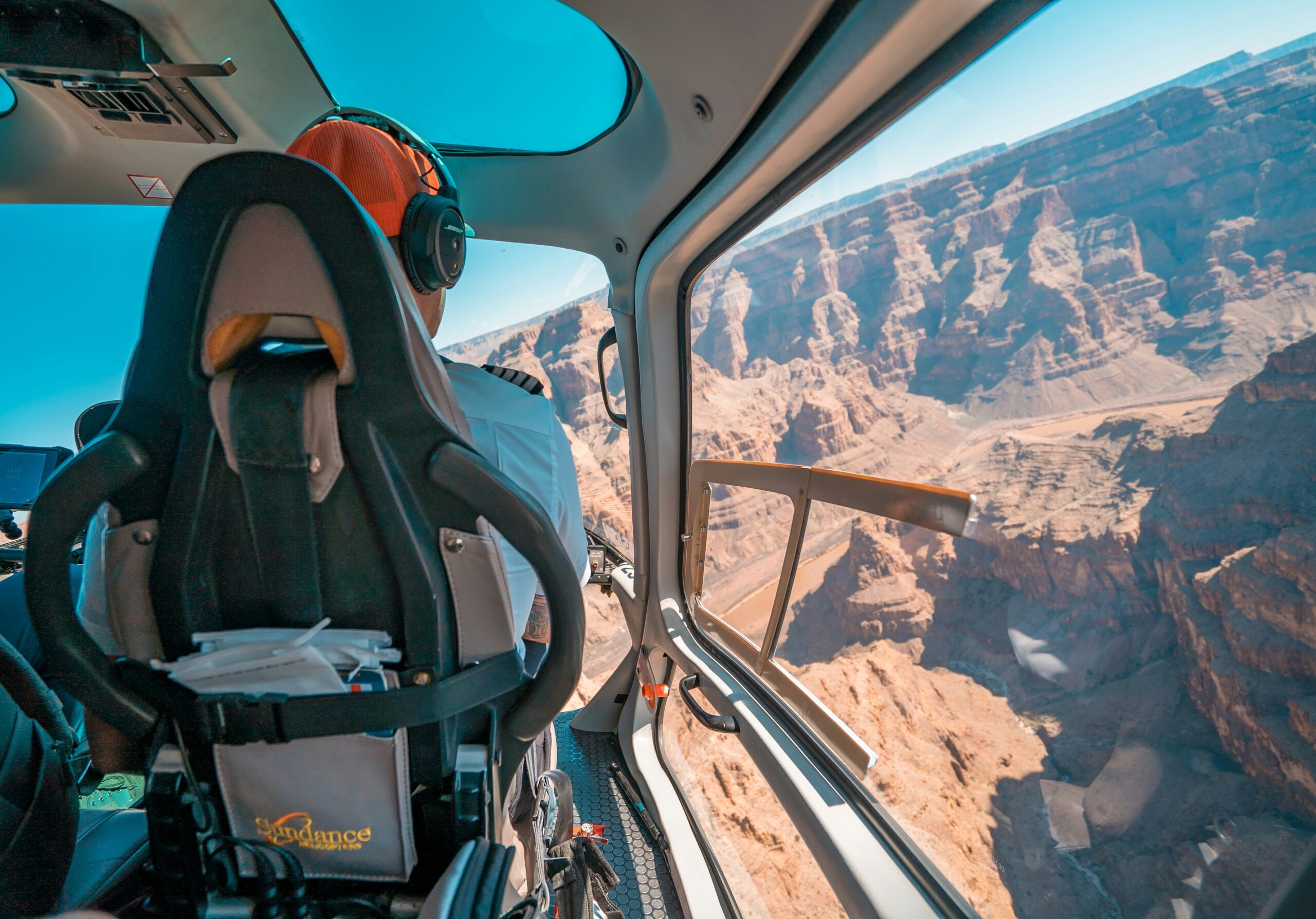 a guy flying a helicopter