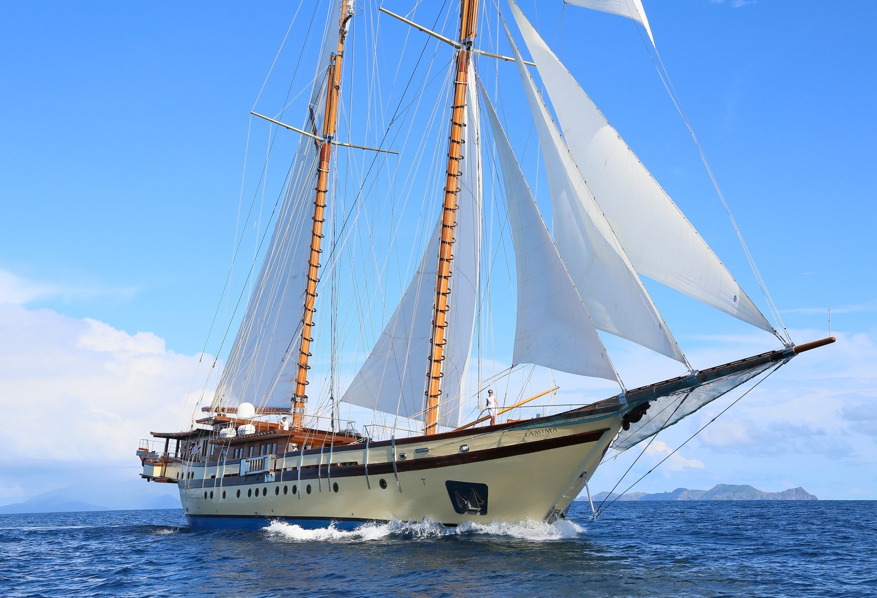 sailboat with big white sails