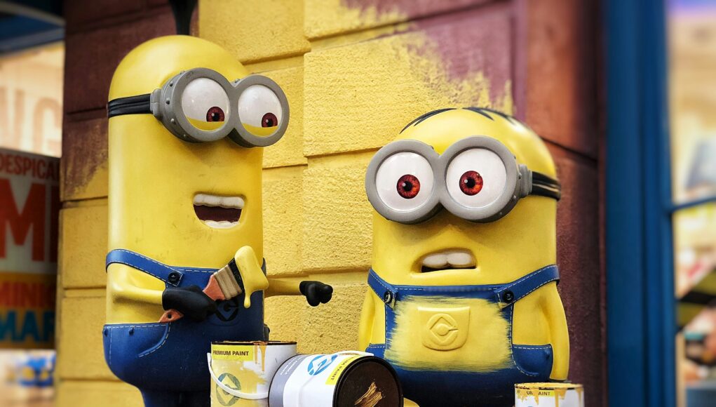 two yellow minions painting