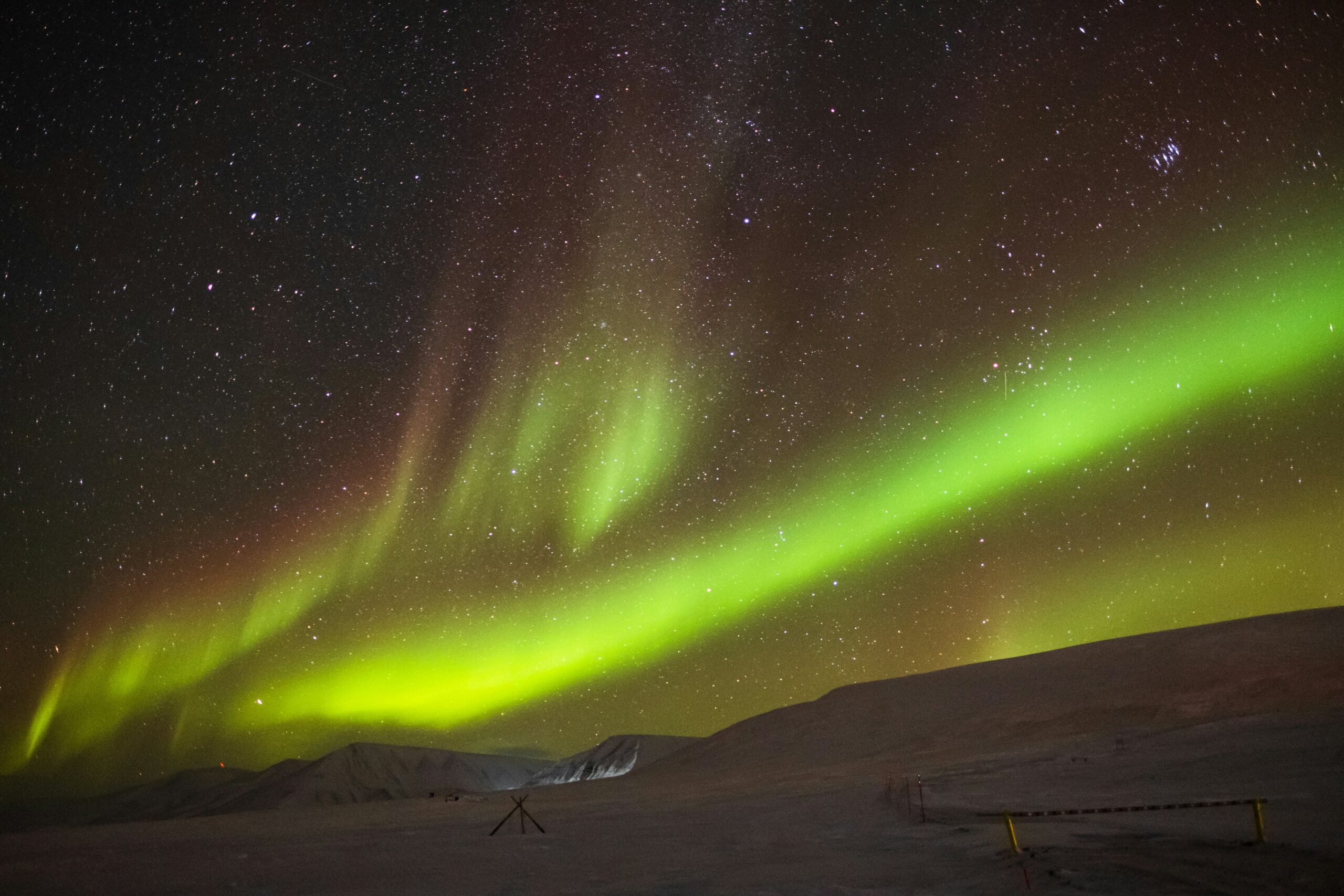green light in the night sky