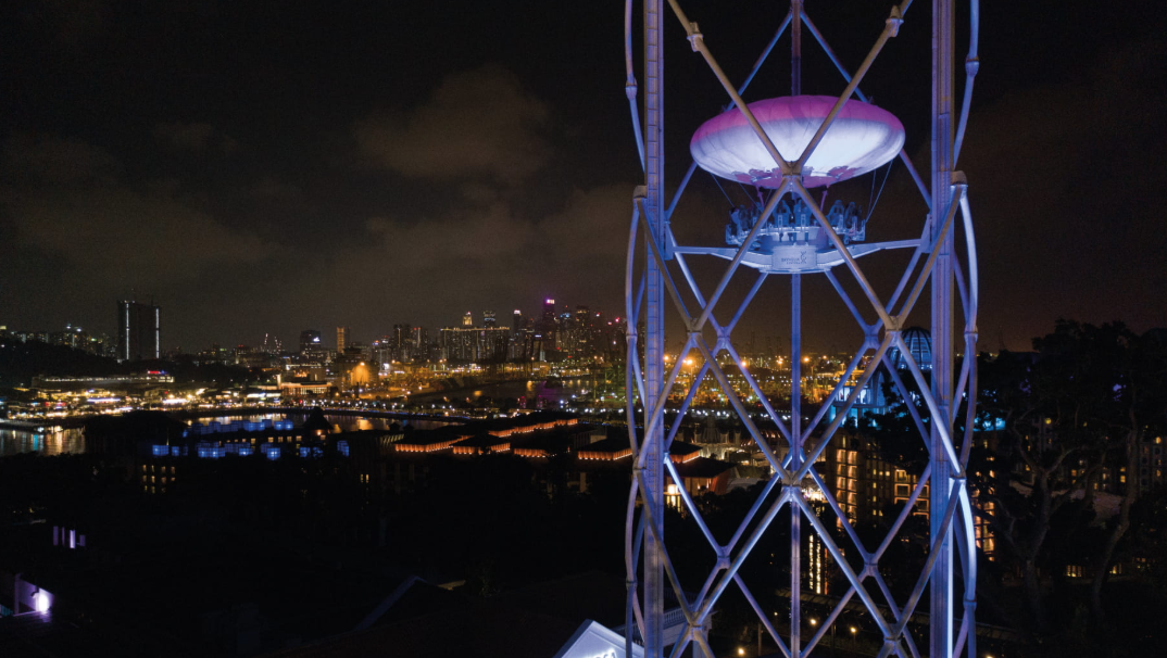 an amusement ride at night