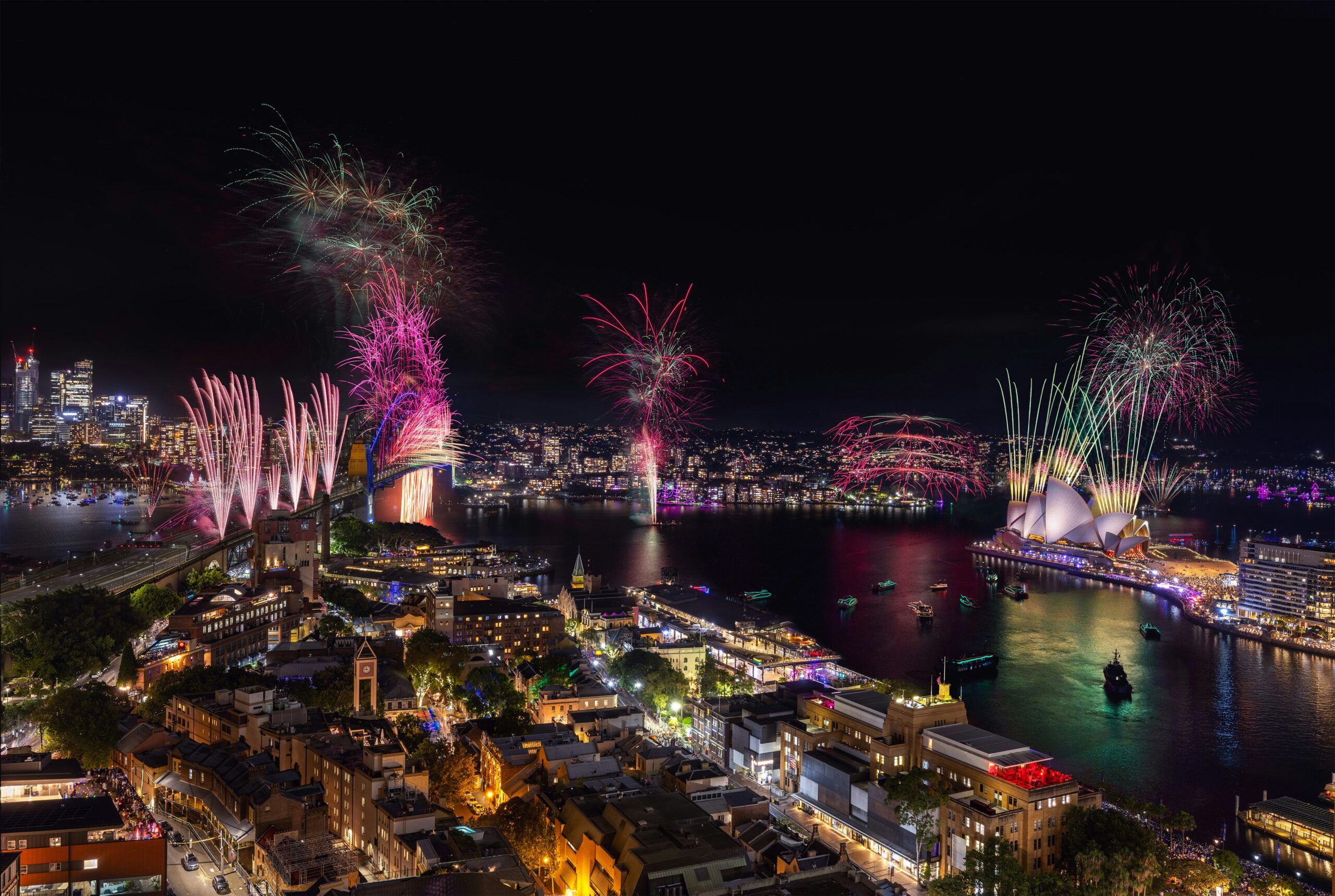 fireworks over a harbour