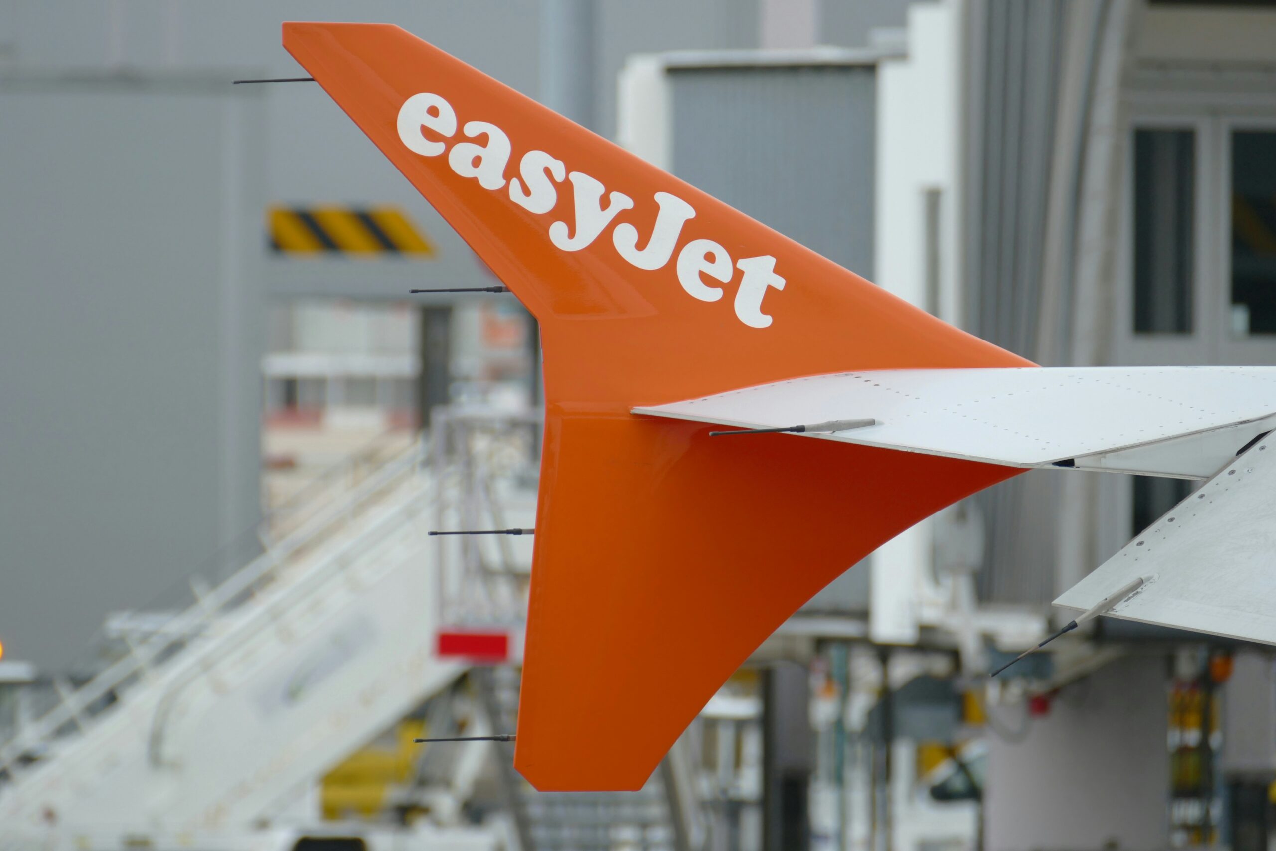 an airplane wing in white and orange
